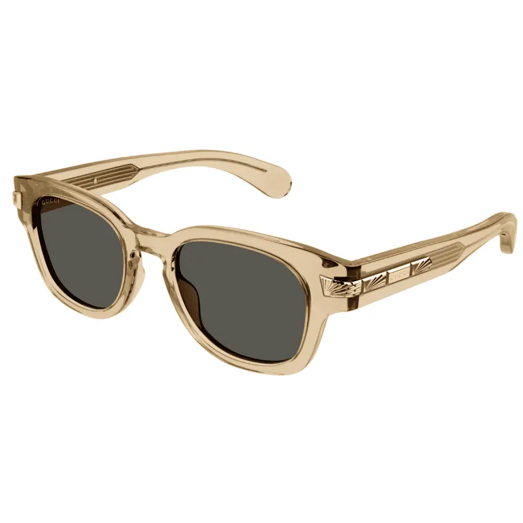 Goldene Sonnenbrille Von Gucci auf weißem Hintergrund.